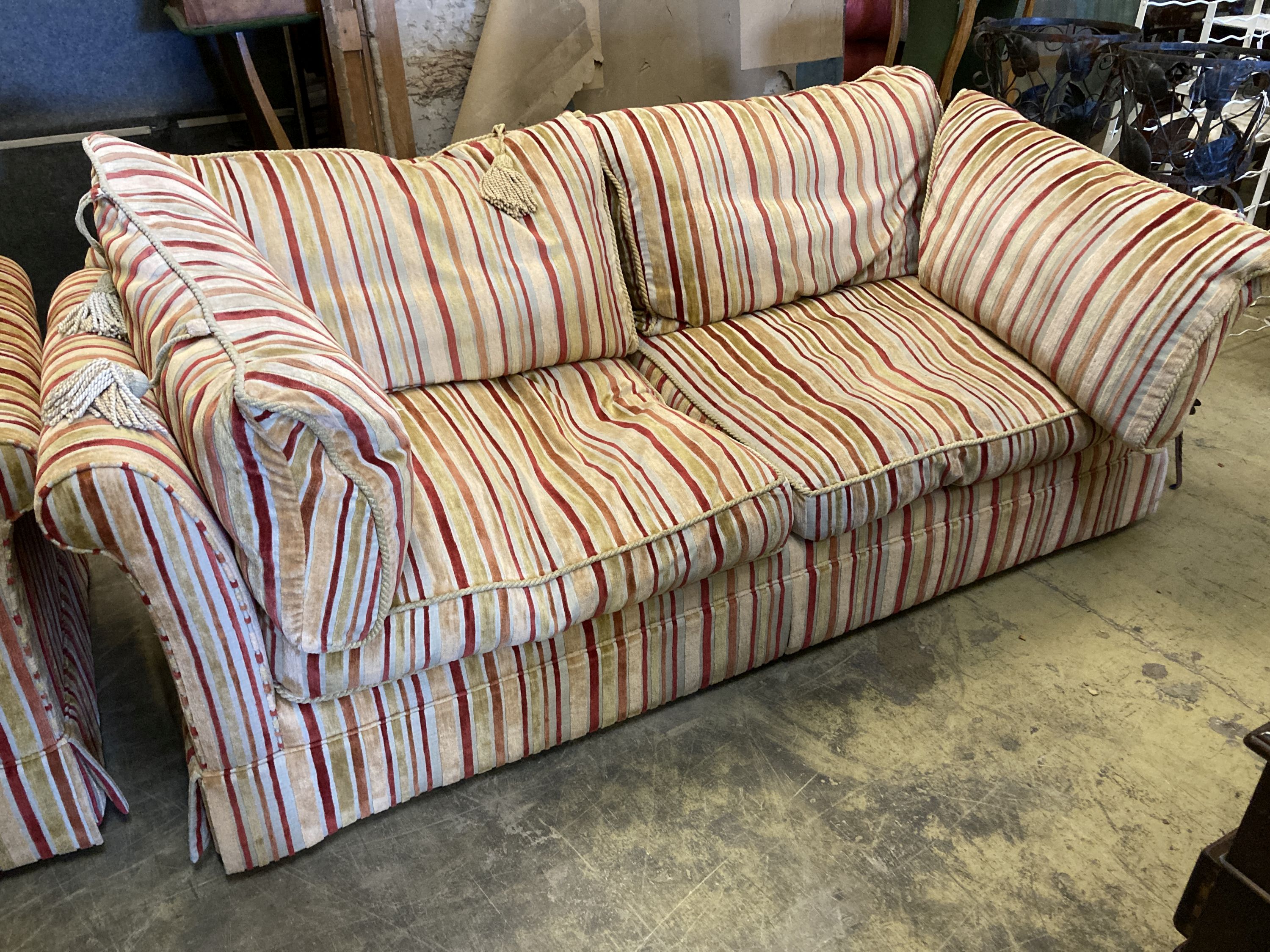 A pair of contemporary sofas covered in cut velvet, larger length 220cm, depth 100cm, height 80cm